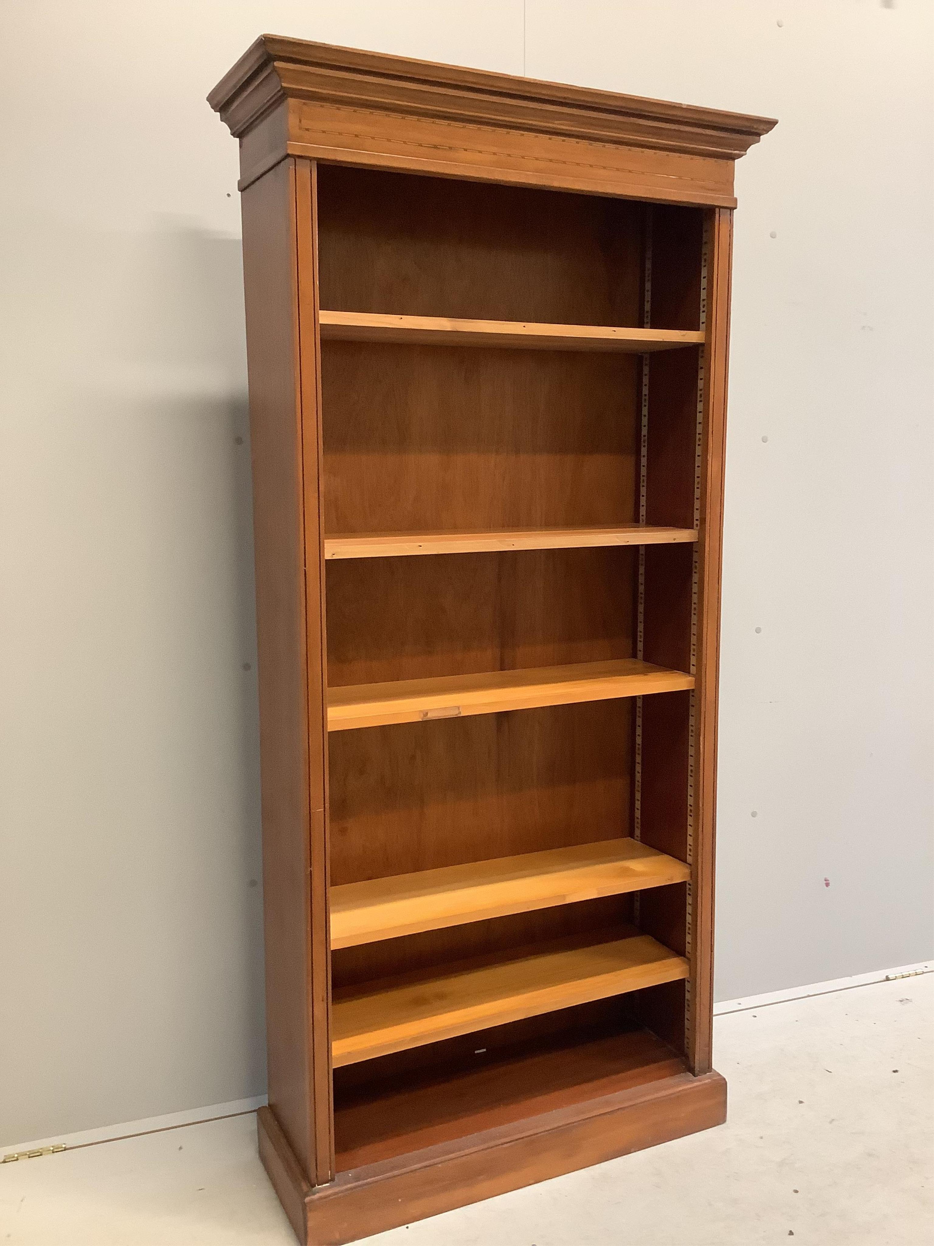 A reproduction Edwardian style open bookcase, width 90cm, depth 32cm, height 186cm. Condition - fair